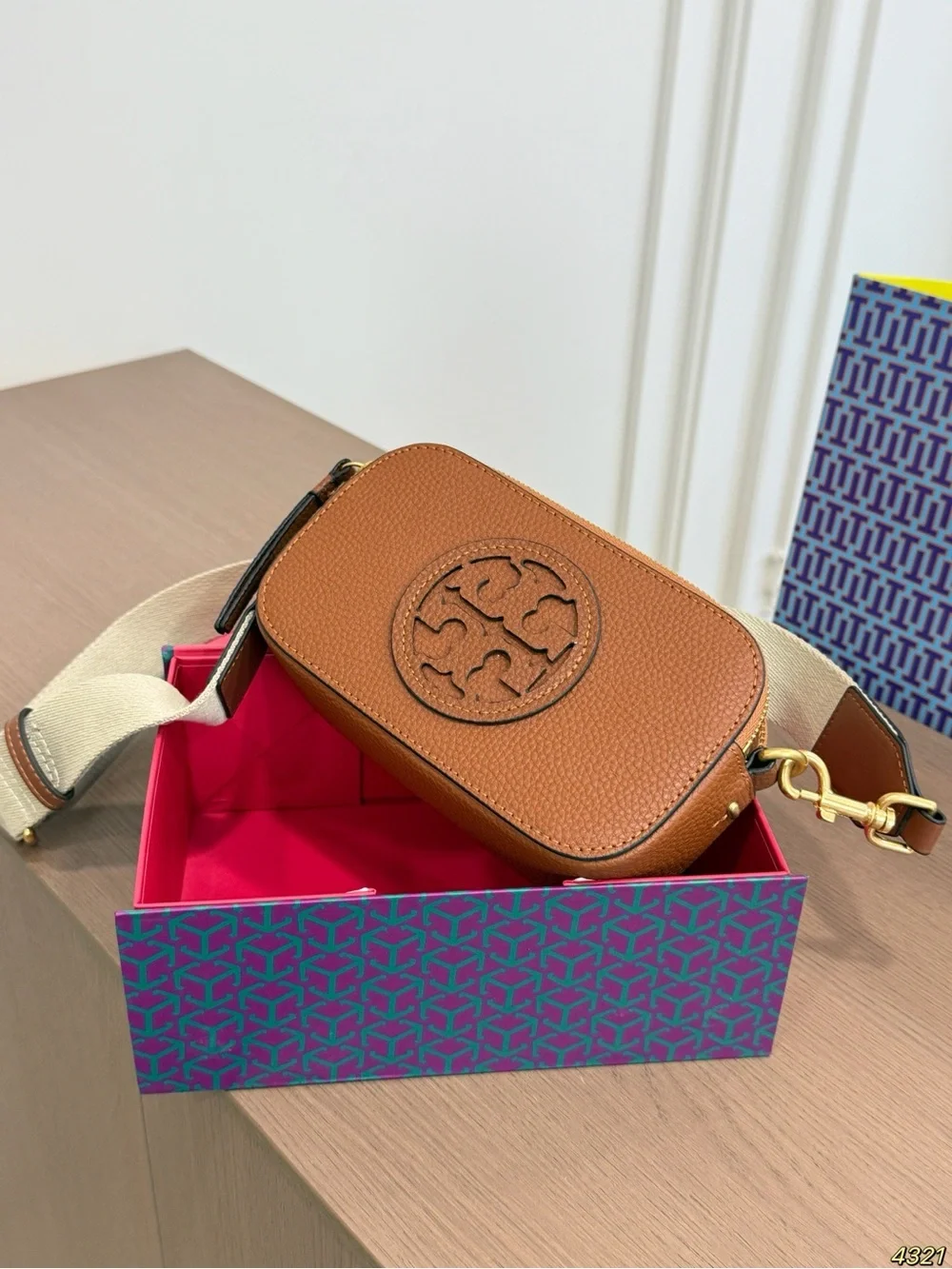Tory Burch Pebbled Leather Logo Camera Bag in Tan with Cream Strap